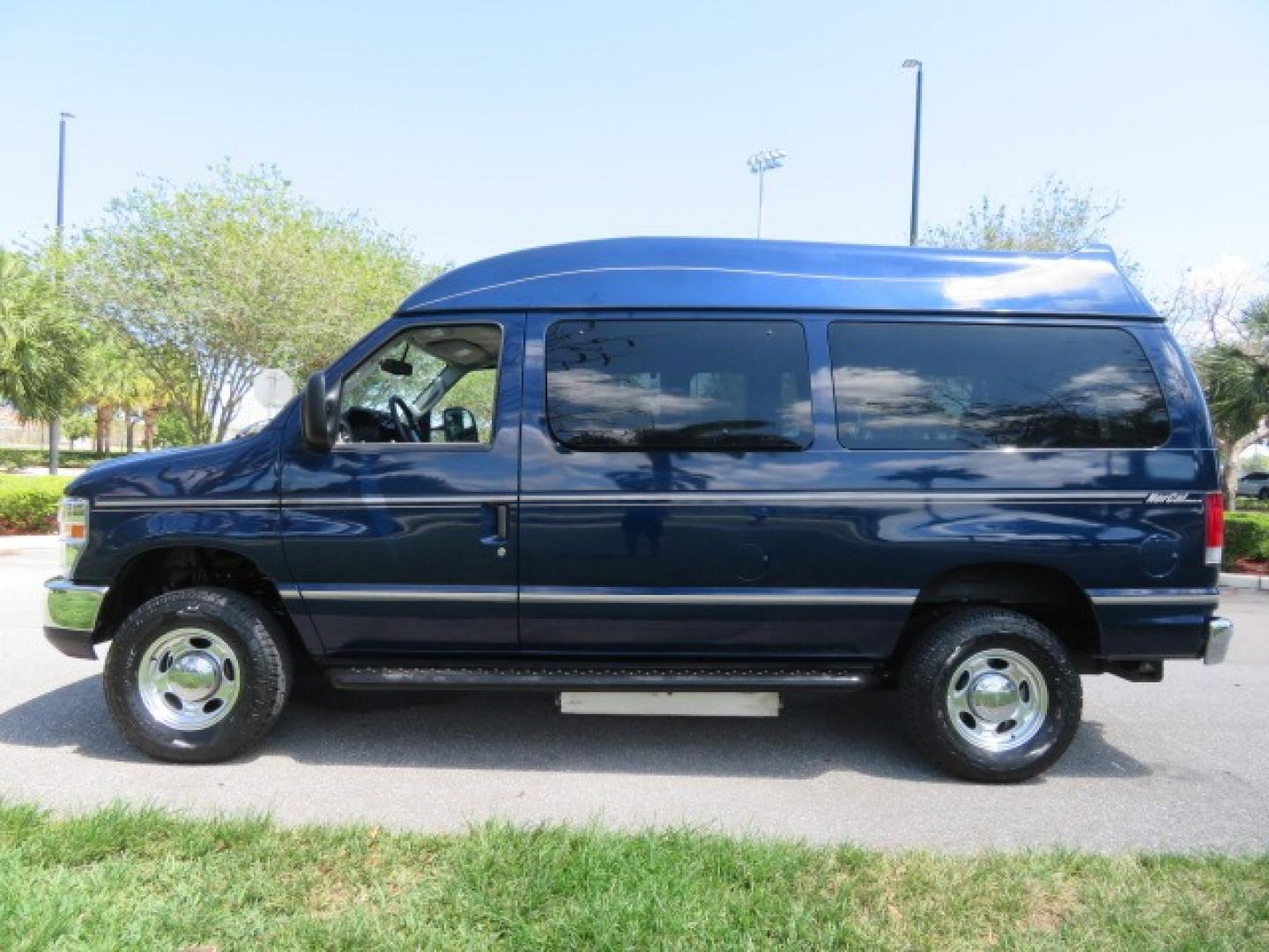 2011 Dark Blue /Gray Ford E-Series Wagon E-350 XLT Super Duty (1FBNE3BS4BD) with an 6.8L V10 SOHC 20V engine, located at 4301 Oak Circle #19, Boca Raton, FL, 33431, (954) 561-2499, 26.388861, -80.084038 - You are looking at a Gorgeous 2011 Ford Econoline E350 XLT Norcal Max High Top Handicap Wheelchair Conversion Van with 6.8L V10, 15K Original Miles, 9 Inch Lowered Floor, Braun UVL Side Entry Wheelchair Lift, Remote Control Power Side Entry Doors, Expanded Side Entry Doors, Q Straint Tie Down, Syste - Photo#11